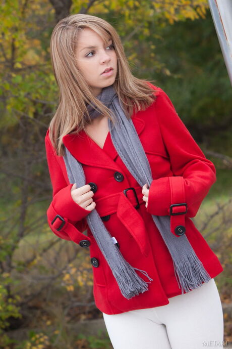 Skinny blonde teen Aspen A shows her tiny tits and bald pussy outdoors