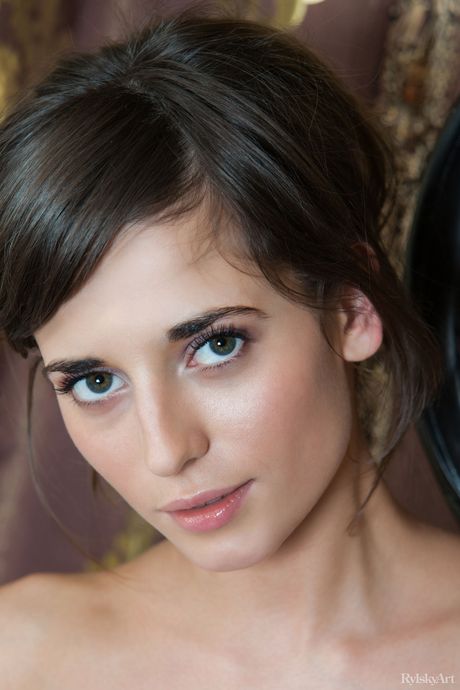 Skinny Russian beautiful Irina B strips and poses nude in her bedroom