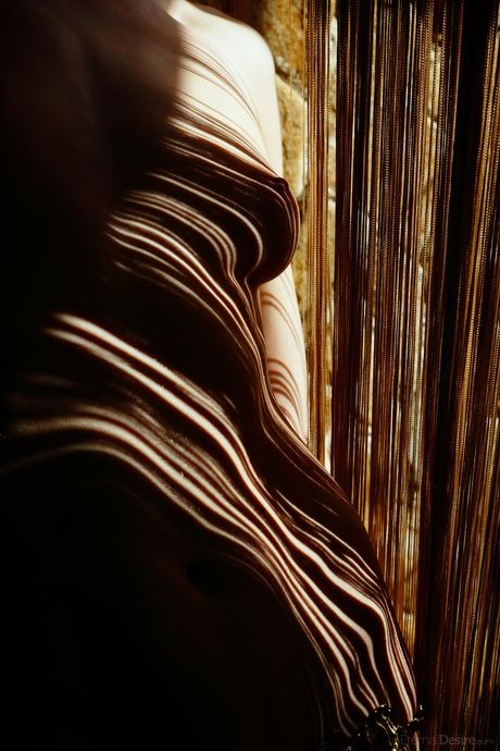 Thin teen Loretta A poses nude and exhibits her small tits and hot ass