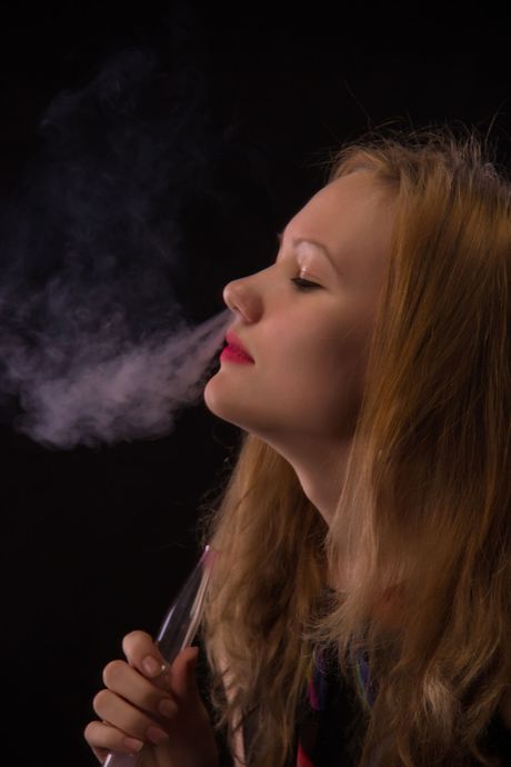 Anna B strips off her sexy lingerie and teases her pussy with a cigarette