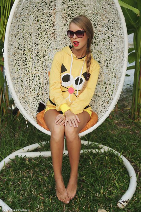 Blonde teen Stella Lane takes off everything on a patio confidently