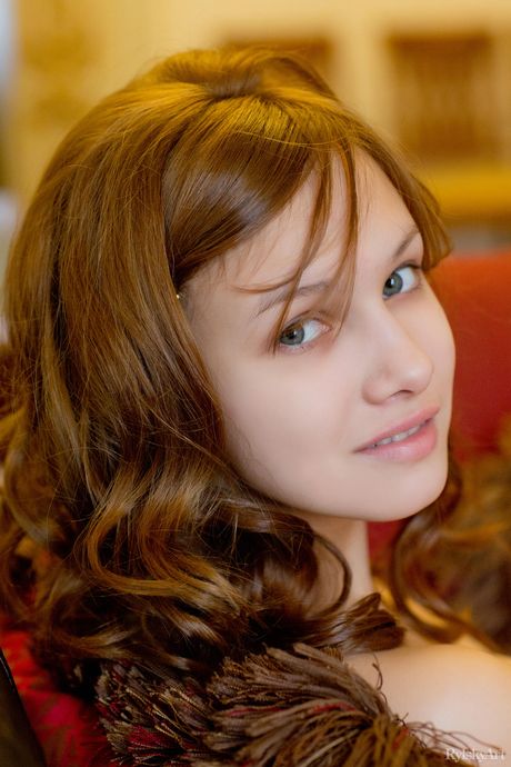 Slender teen Demetra highlights her landing strip pussy while totally naked