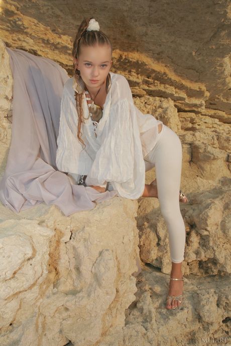 Adorable teen Milena D reveals her tiny tits and poses naked