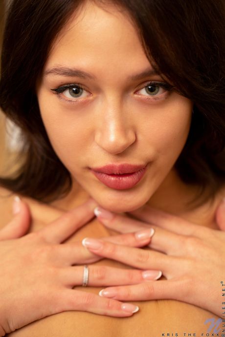 Thin teen Kris The Foxx removes her lingerie before fingering her pussy