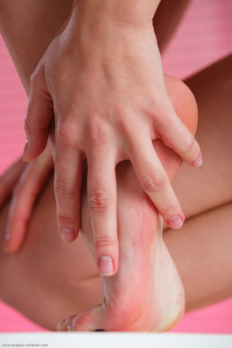 Pure teen Milagres A removes her dress to pose nude in her bedroom