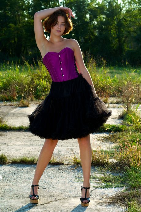 Innocent teen Amaya strips off with certainty on a rocky outcrop