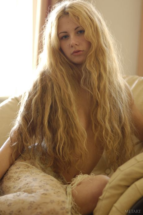 Delightful teen Sasha M gets naked boldly during solo action