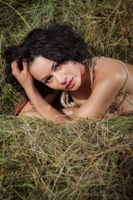 Lovely teen Pammie Lee removes her dress and exhibits her big tits & twat