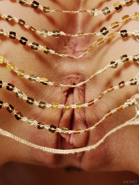 Gorgeous teen Gisele A removes her lingerie to pose nude