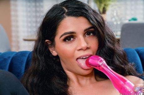 Sexy brunette Harley Haze toys her horny pussy in black stockings