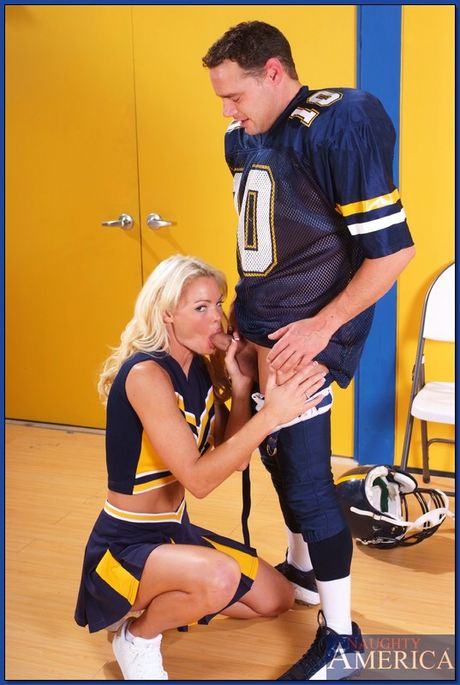 Blonde cheerleader Rhylee Richards has sex with a football player in a gym