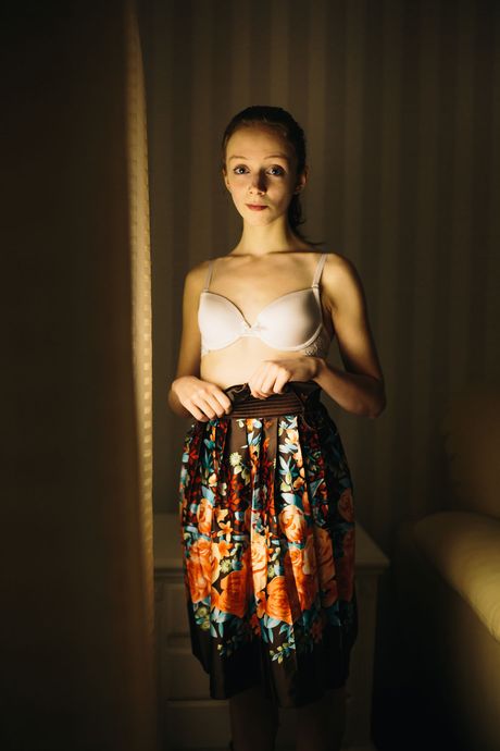 Thin teen Ginny H gets completely naked on a sofa with grace