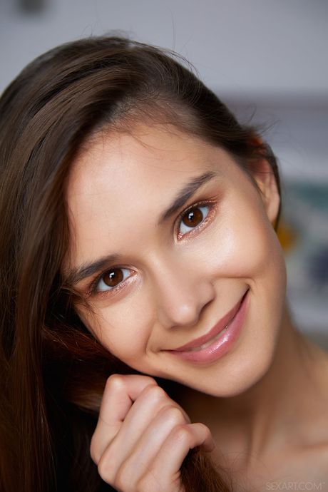 Leona Mia gets bare naked in her bedroom and shows off her sexy body