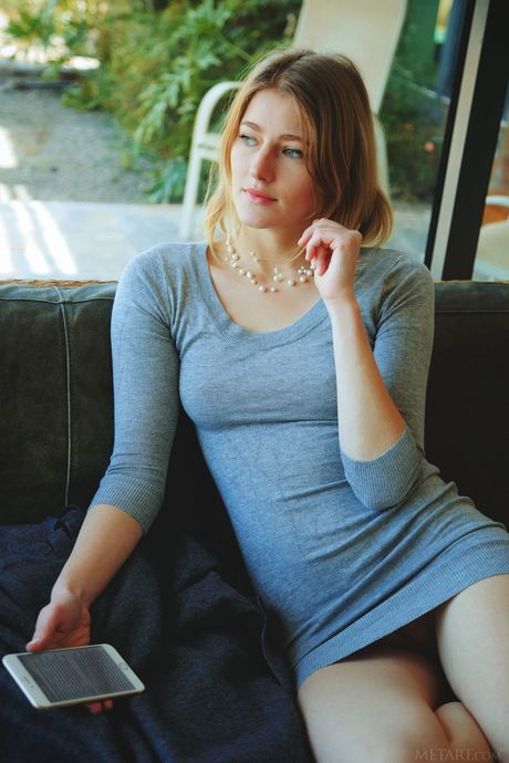 Cute teen Mila I removes her dress and poses naked