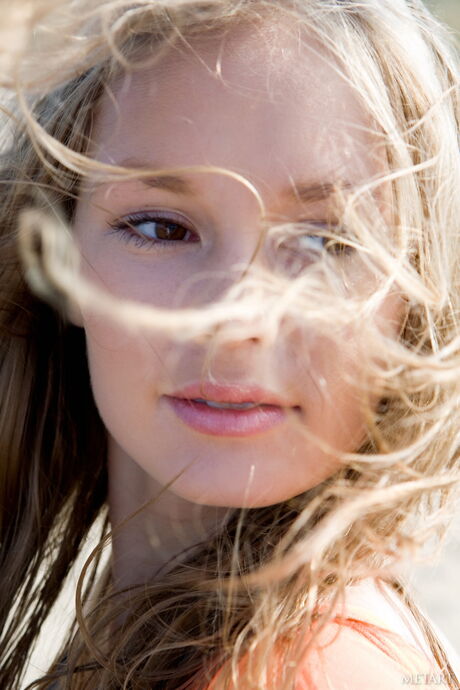 Russian beauty Caesaria A models naked on a beach in a sexy manner