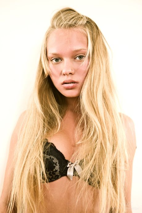 Petite teen Willa shows her small tits and her shaved vagina in a solo