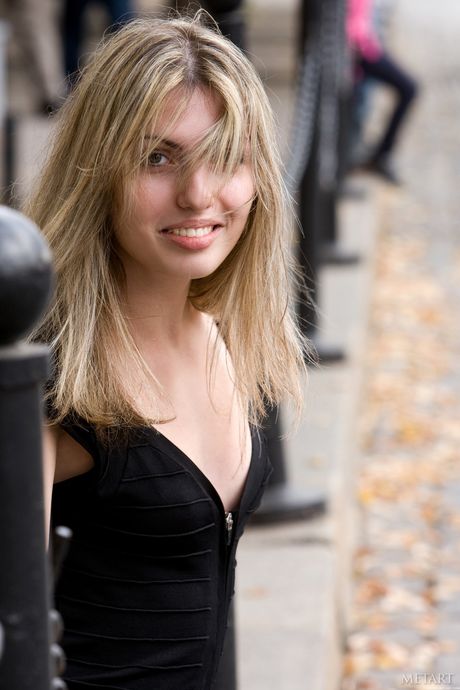 Innocent teen Maggie A gets naked on a bed before a creampie scene