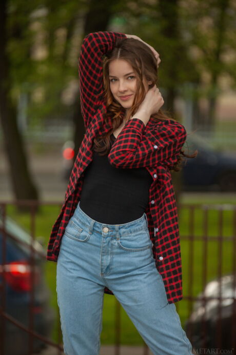 Winsome teen Cherish removes her socks before showing her bald pussy in the nude