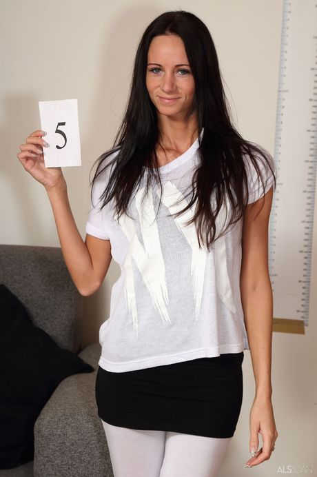 Slender teenage blonde with tiny tits Eveline Neill poses naked outdoors