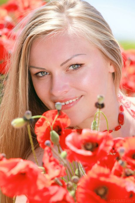 Ukrainian lovely Alessandra A shows her big tits and poses nude in nature