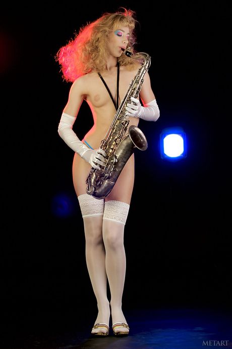 Sexy blonde teen Sandra C removes her lingerie to pose nude in heels