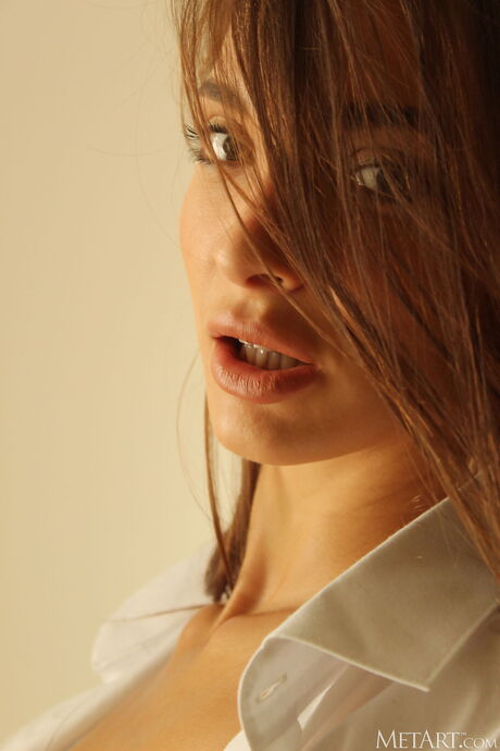 Ukrainian fair Santa gets naked in her bedroom and shows her bald pussy in a solo shoot