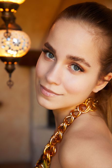 Alluring teen Cassia removes a short dress to get naked fearlessly