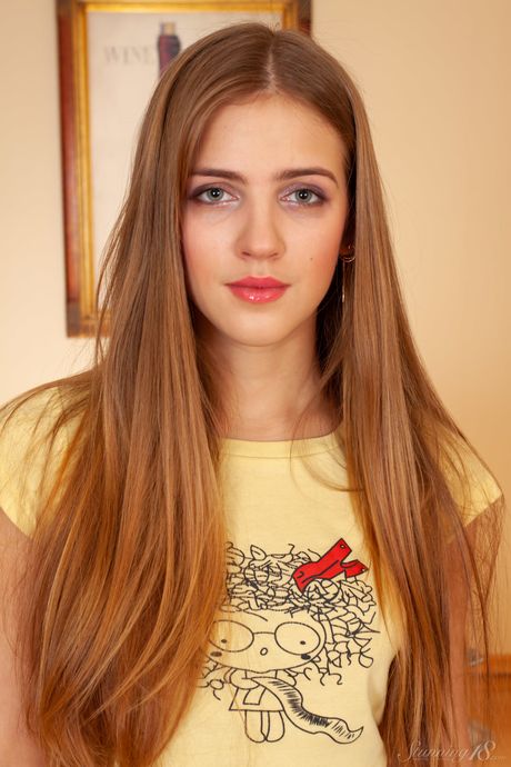 Teen model Hanna A gets naked in a pair of socks during a solo engagement