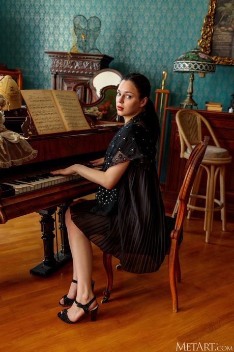 Pretty teen Nikta removes her lingerie to get naked confidently