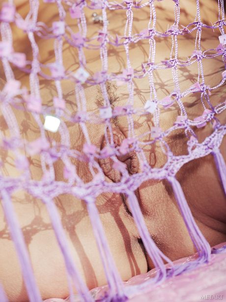 Adorable teen Kayla B removes a bikini before getting naked on a patio