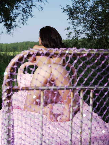 Adorable teen Kayla B removes a bikini before getting naked on a patio