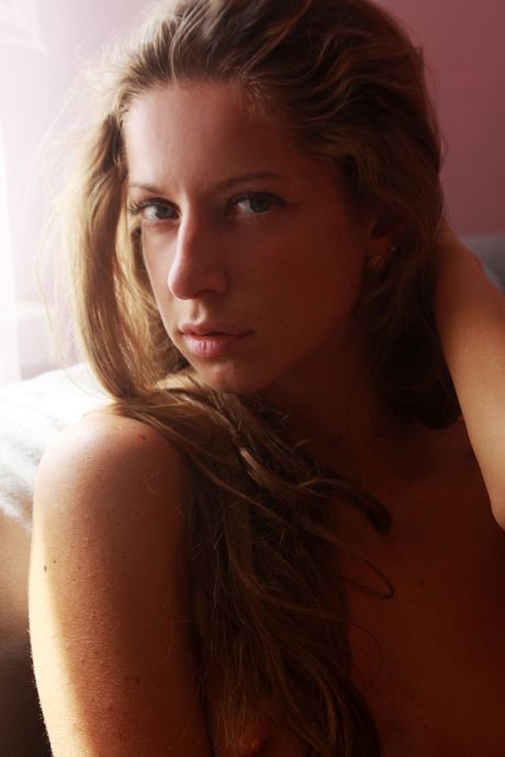 Svelte teen Mika A strips her white dress & shows her hot ass & bald pussy