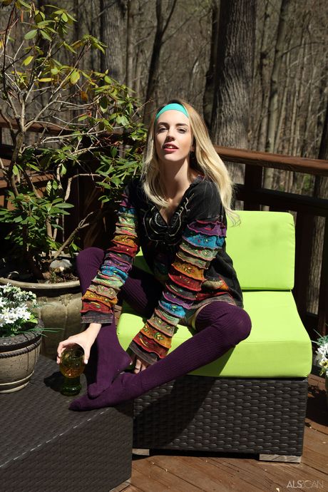 Blonde teen Blake Eden gets double penetrated on a deck in white socks