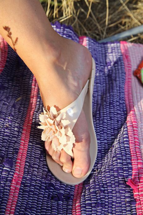 Attractive teen Mirabella removes her glasses and lingerie to pose nude in nature