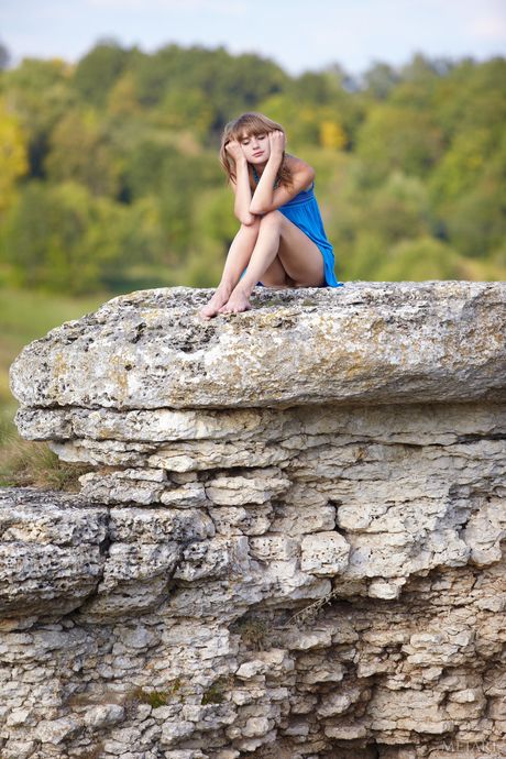 Thin teen Veda A shows her hairy pussy & small tits in a solo