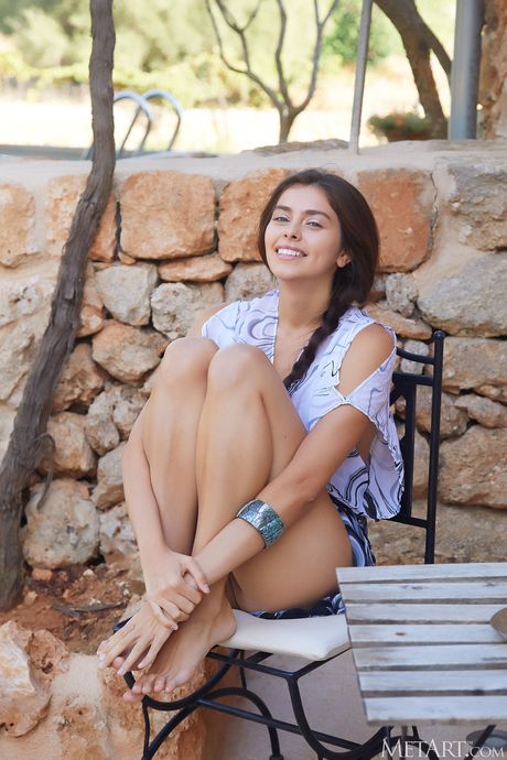 Delicate teen Foxy Alissa shows her tiny tits and poses naked on a terrace