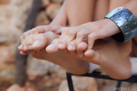 Delicate teen Foxy Alissa shows her tiny tits and poses naked on a terrace