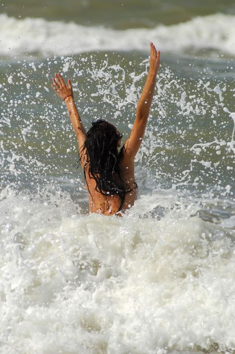 Young girl Eldoris Q takes off everything in a tidal pool while on a beach