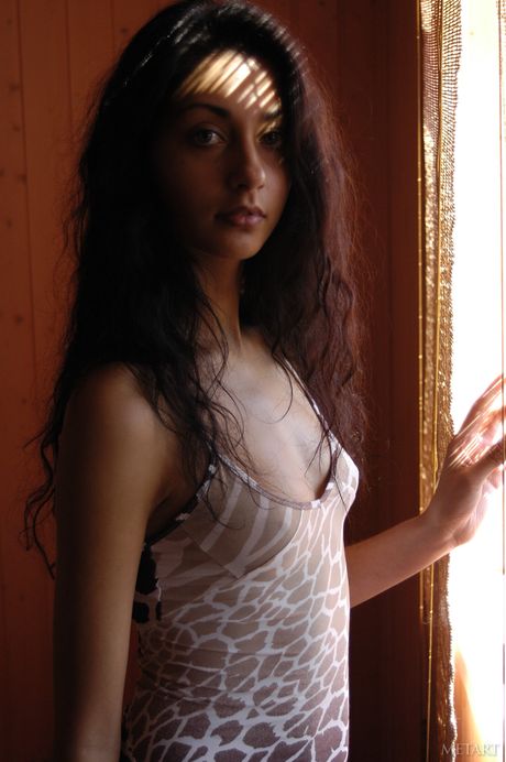 Delicate teen Olesya B highlights her big tits and poses naked