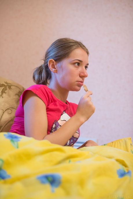 Precious teen Yani A removes her lingerie and poses nude in front of a mirror