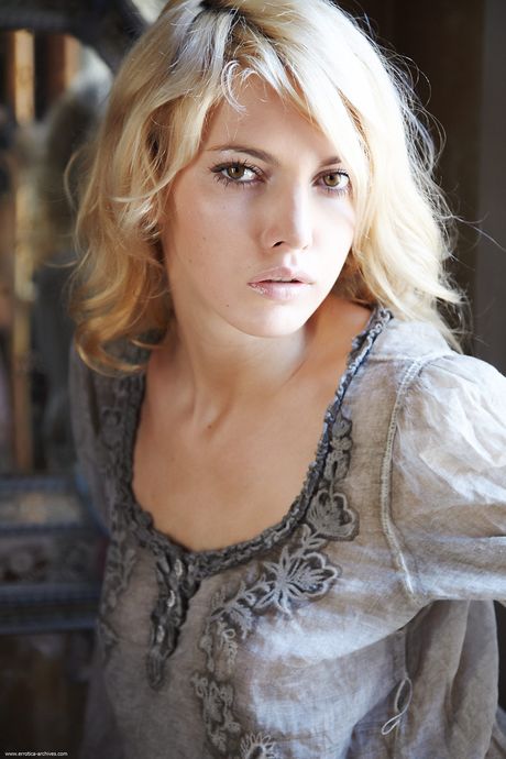 Errotica Archives: Lean teen Lilly shows her tiny tits and bald pussy in the nude