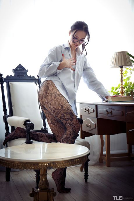 Gabby Bella is reading a book when she gets horny and decides to masturbate