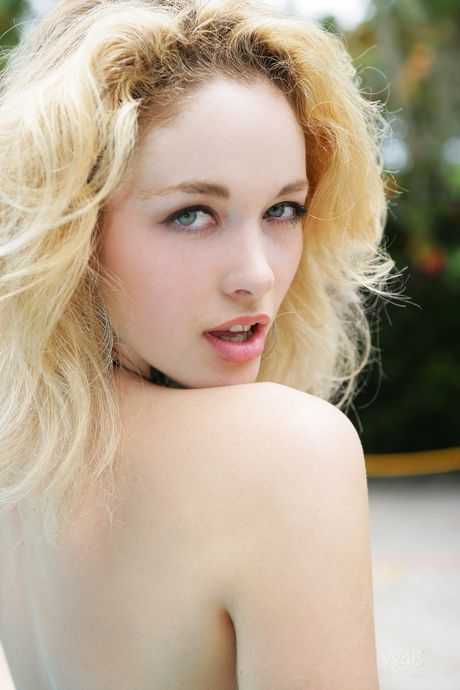 Skinny teen Alissa White shows her tiny tits and shaved vagina in a pool