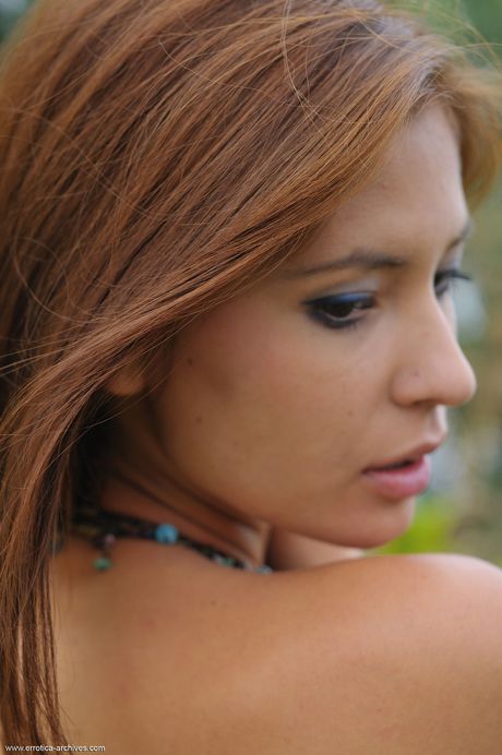 Skinny Russian babe Afrodita posing nude in the forest & showing her holes