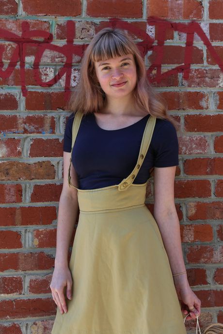 Adorable teen Laney removes her clothes to pose nude in white socks