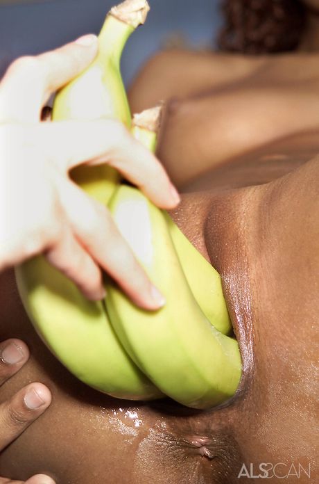 Sexy ebony teen Jasmine strips and masturbates in the kitchen