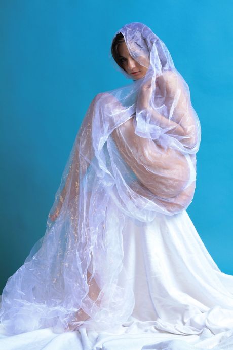 Lean teen Michaela Isizzu removes a wedding veil and panties to pose nude