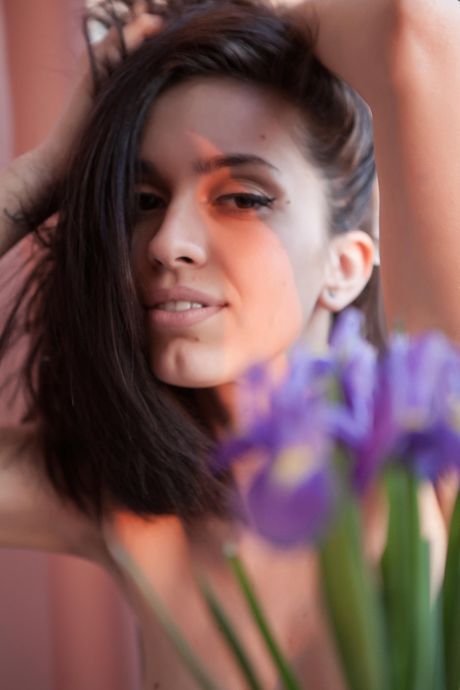 Helen H shows her big tits and sweet pussy as she poses naked on a chair