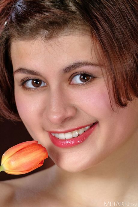 Intriguing teen Euhenia strips her lingerie & poses nude in her bedroom