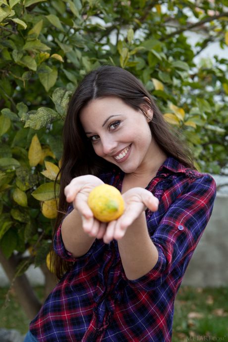 Delicate teen Lorena B removes her bikini to pose nude